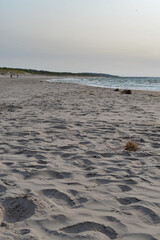 Fototapeta premium beach, sea, water, sand, sky, ocean, coast, sun, nature, landscape, wave, summer, shore, sunset, waves, coastline, clouds, surf, travel, sunrise, dusk, winter, island, dune, cloud
