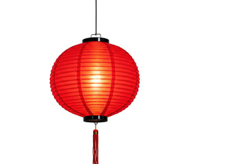 Fototapeta premium A bright red chinese paper lantern with a tassel hangs illuminated against a plain transparent background