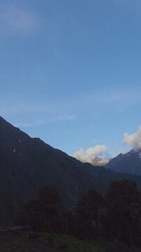 A panoramic shot of a valley in Manali during sunset, Himachal Pradesh, India.