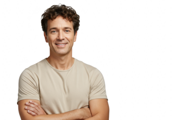 A confident middleaged man with curly hair smiles with his arms crossed, isolated on transparent background