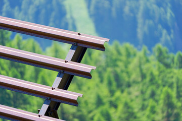 Mountain landscape with close up of metal avalanche protection at Lötschental Valley in the Swiss...