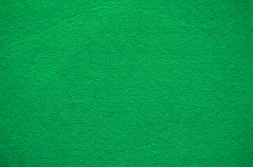 Green felt fabric background texture.
