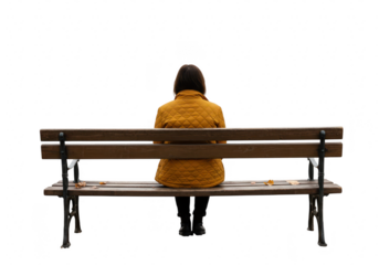 A woman in a yellow coat sits on a park bench in autumn, isolated on transparent background