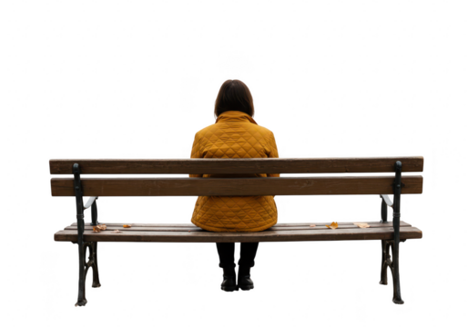 A woman in a yellow coat sits on a park bench in autumn, isolated on transparent background