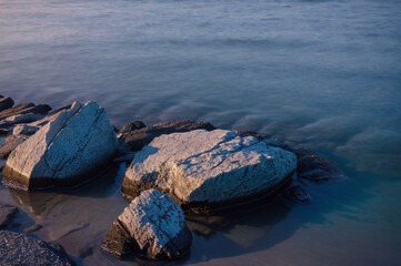 Rocky shoreline in at night