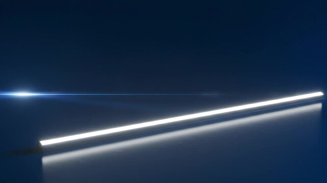Linear light fixture shines on dark blue surface, creating reflection