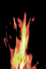 Close up burning flames on black background for graphic design or wallpaper.