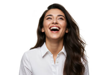 A young woman with long dark hair laughs heartily, looking upwards with a wide smile, isolated on transparent background