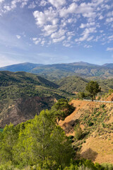 Fototapeta premium Hiking trail to Mulhacen peak in the spring in Sierra Nevada National Park, Spain