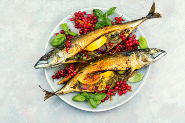 Baked mackerel fish with berries, seafood