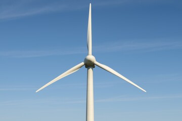 Realistic Wind Turbine Against Clear Blue Sky with Simple Design