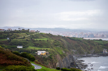 Cloudy landscape of the seacoast as seen from the elevated Providencia viewpoint, offering dramatic...