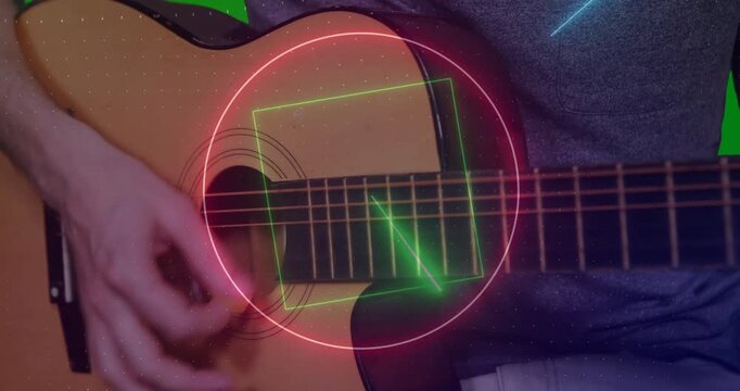 Guitarist strumming guitar causing neon shapes pulsing expanding and rotating synced with rhythm