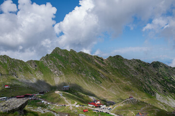 Mountain hiking in the Fagaras Mountains in Romania. Scenic alpine landscape in the Carpathians with dramatic ridges and summer nature views.