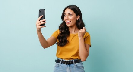 Excited Young Woman Taking a Selfie or Video Calling with a Smartphone

