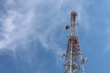 Cell phone tower with an antenna for mobile telecommunication and wireless network technology in...