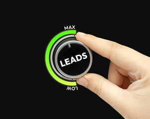 Generating Maximum leads concept backgorund with hand turning knob to full, glowing bar. Business, funnel, growth, strategy