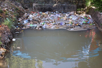 Piles of rubbish that clog the drains