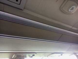 Obraz premium Inside Indonesian Public Bus Luggage Rack Compartment