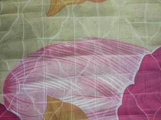 Quilted Fabric with Abstract Pink and Green Pattern