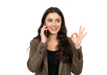 A woman in a blazer talks on a mobile phone, giving an ok sign with her hand, isolated on a transparent background