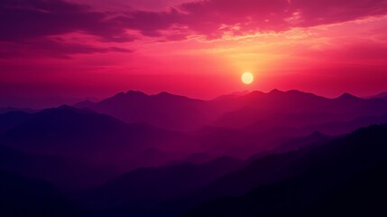 Fototapeta premium Sunset Over Mountain Ridges with Dramatic Pink and Orange Sky