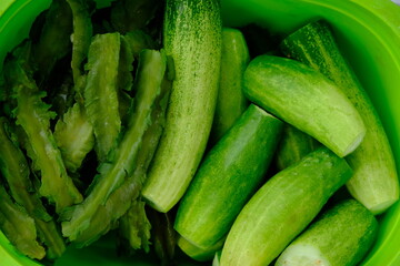 lalapan. cucumber salad and boiled winged beans.