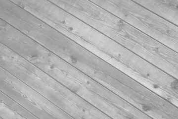 Holztextur mit diagonalen hellen Holzbrettern als Hintergrund