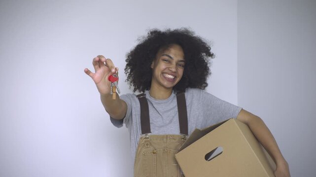The radiant lady proudly flaunts her newly obtained house keys.