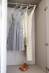 Dresses and Shoes in Open Wardrobe