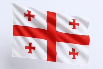 National flag of Georgia with red crosses on a white background waving outdoors.
