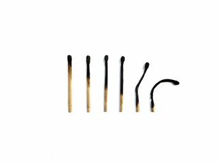 Burn and whole matches on white background	