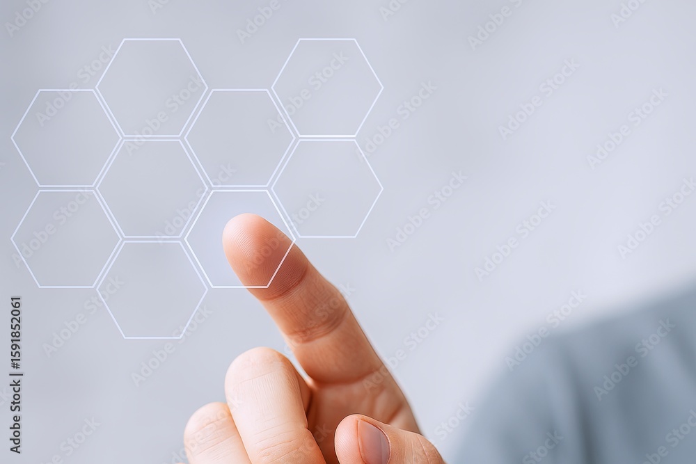 Aufkleber person interacting with futuristic digital interface showing holographic hexagonal grid.