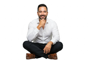 A happy man with a beard sits crosslegged, resting his chin on his hand with a smile, isolated on a transparent background
