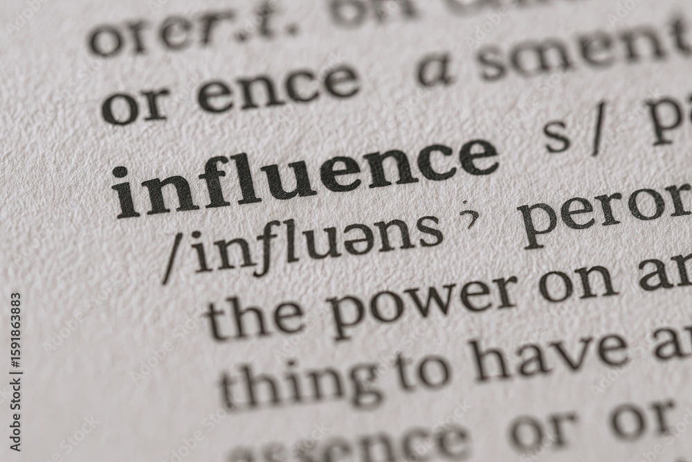 Poster close-up of a dictionary page showing the word influence with pronunciation and definition.