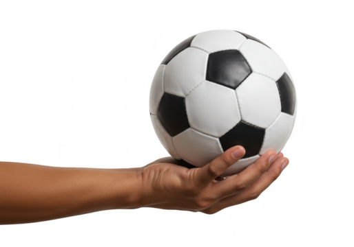 A persons hand gently holding a classic black and white soccer ball, isolated on a transparent background