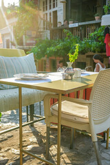 Cozy Sunlit Cafe in the Old Town of Bar, Montenegro – Charming Outdoor Seating and Historic Atmosphere