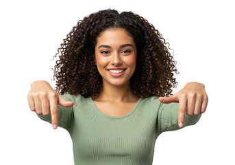 A young woman with curly black hair smiles and points down, isolated on transparent background