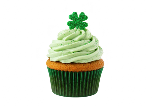 A festive green cupcake topped with swirls of icing and a sparkling shamrock for st patricks day, isolated on white isolated on transparent background