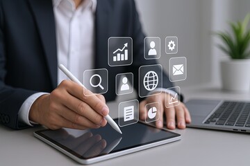 Modern business professional using digital tablet with virtual icons for communication and analysis.