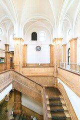 Interior of Historical Building with Elegant Arches and Columns