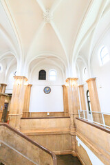 Interior of Historical Building with Elegant Arches and Columns
