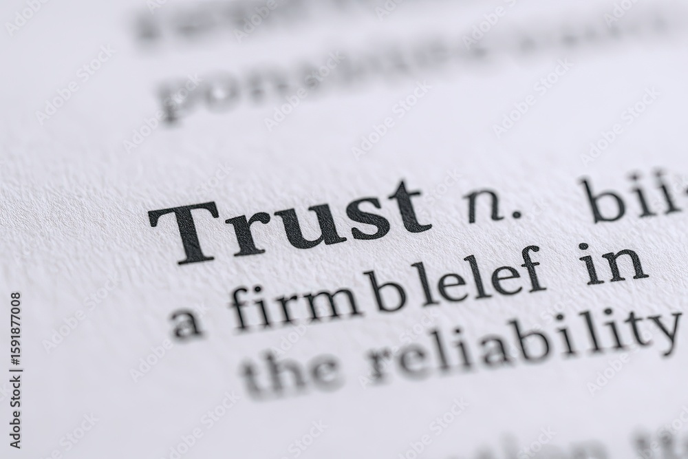 Poster close-up of the word trust in dictionary page with definition emphasizing reliability and confidence