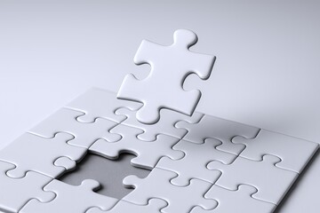 Fototapeta premium White Puzzle Pieces Assembling Concept Background with Missing Piece Representation.