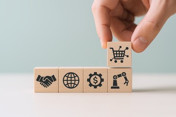 Hand placing wooden block with shopping cart icon on top of other blocks, e-commerce concept.