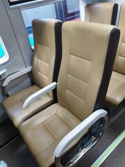 Economic class Train Interior with Comfortable reclining Seats in Beige colour