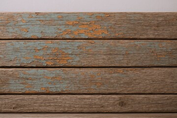 Fototapeta premium Weathered Wooden Planks with Chipped Paint Texture and Rustic Surface.