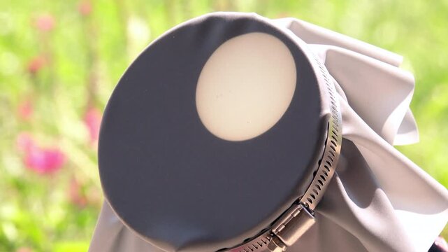Solar projection of face of sun with sunspots.