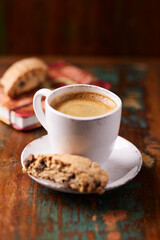 Cup of coffee on wooden background. Soft focus. Copy space	