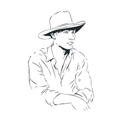 Young man in a wide brimmed hat displaying a thoughtful expression